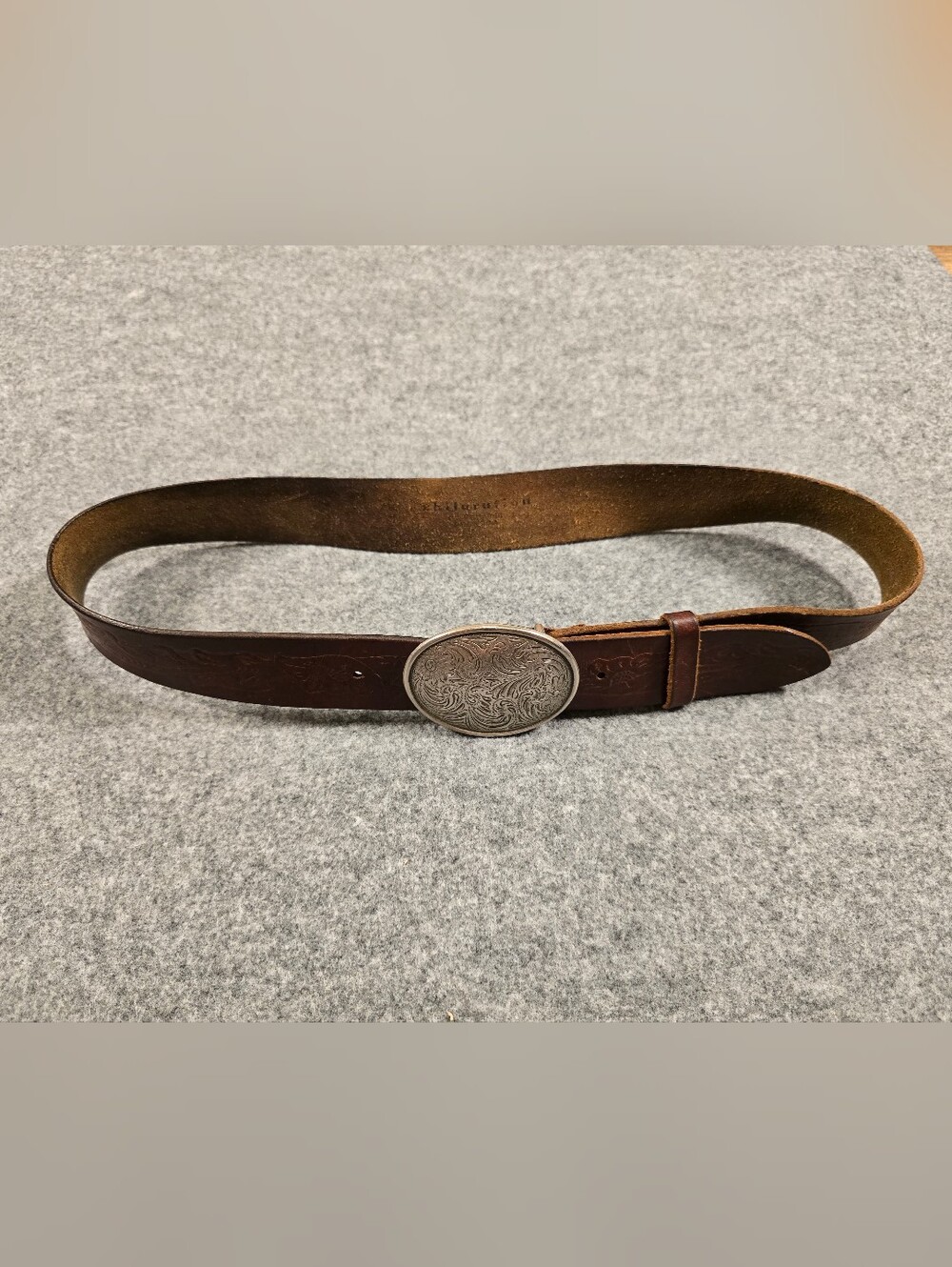 Classic Brown Leather Belt with Decorative Silver-Tone Buckle
